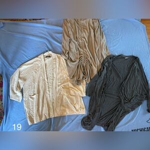 Set of 3 cardigans.